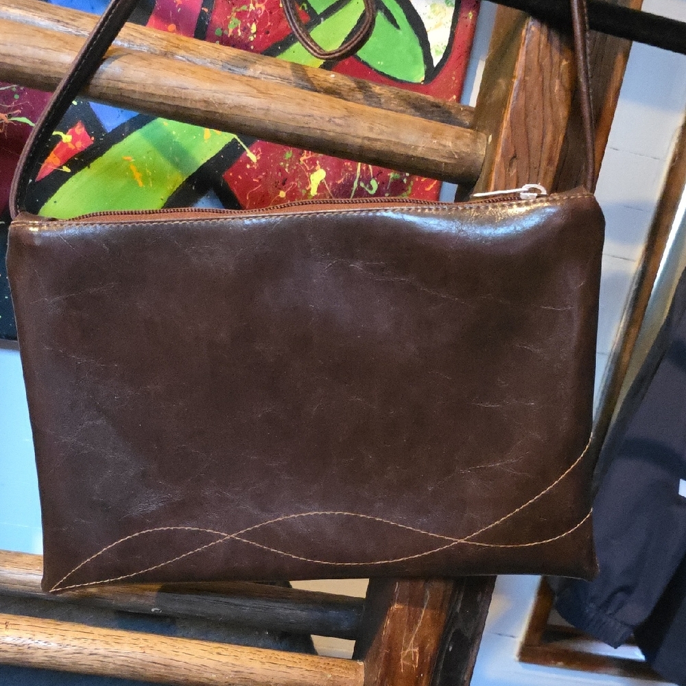 Sophisticated Brown Leather Crossbody Bag with Flap Closure